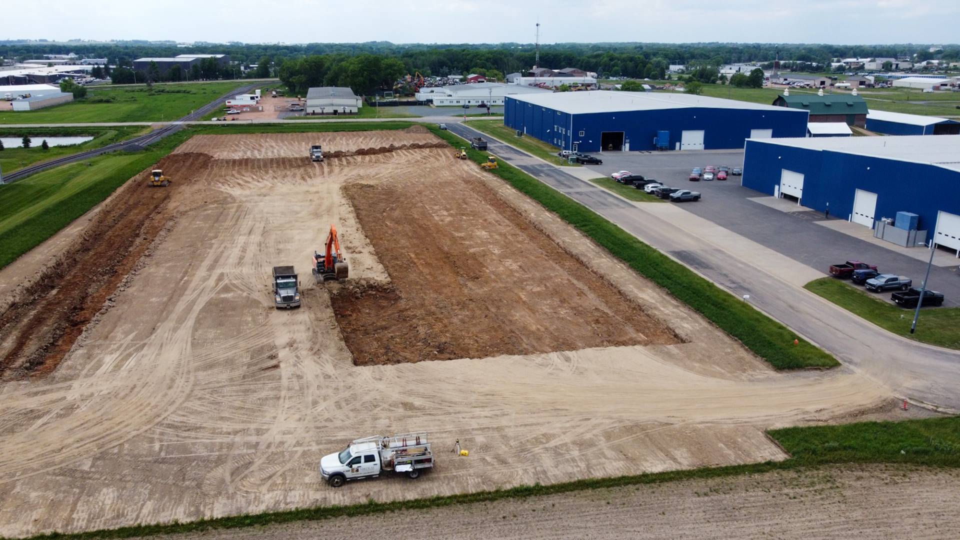 Plant 3 Construction DURING drone footage digging dirt
