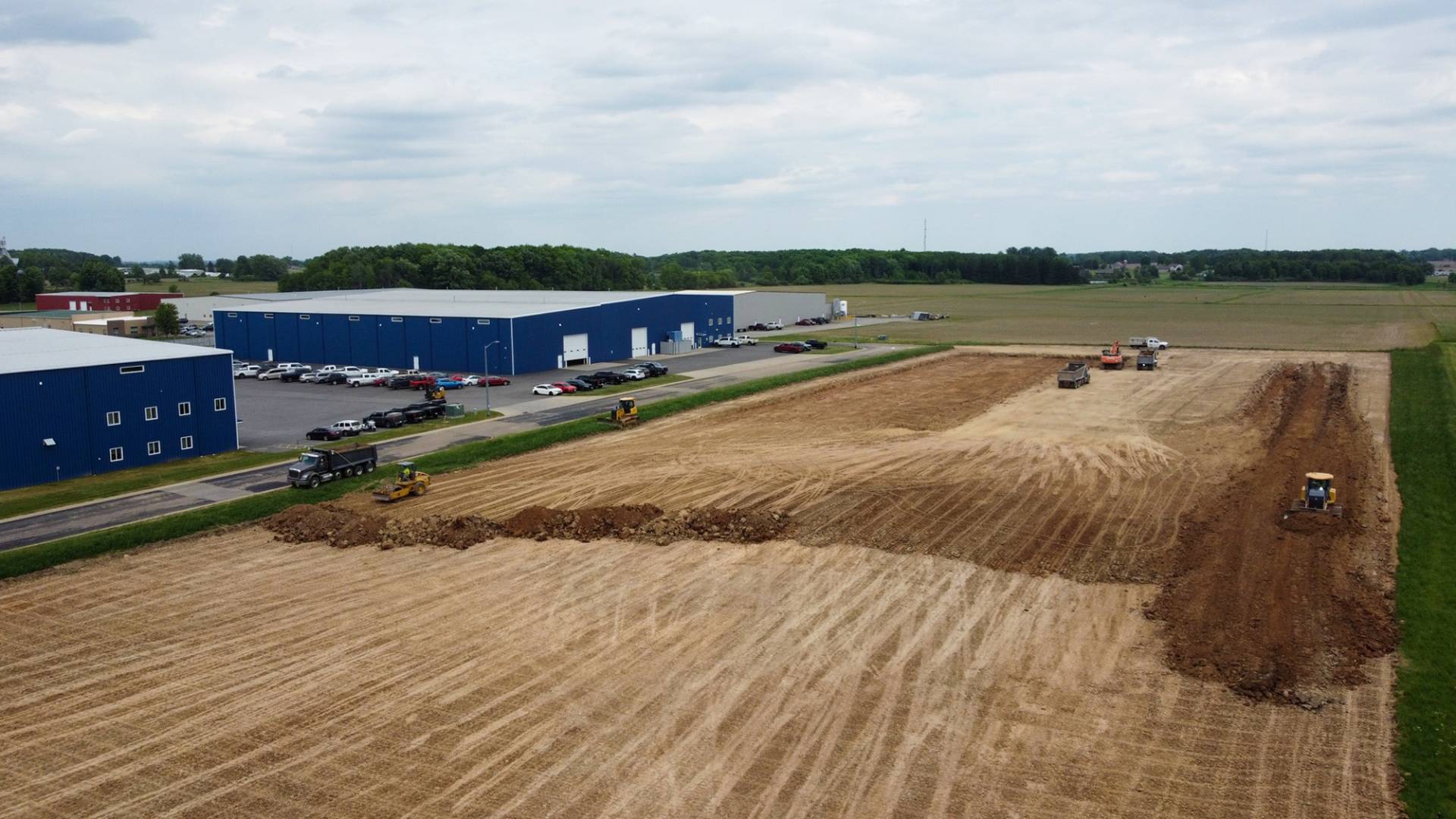 Plant 3 Construction DURING drone footage digging dirt