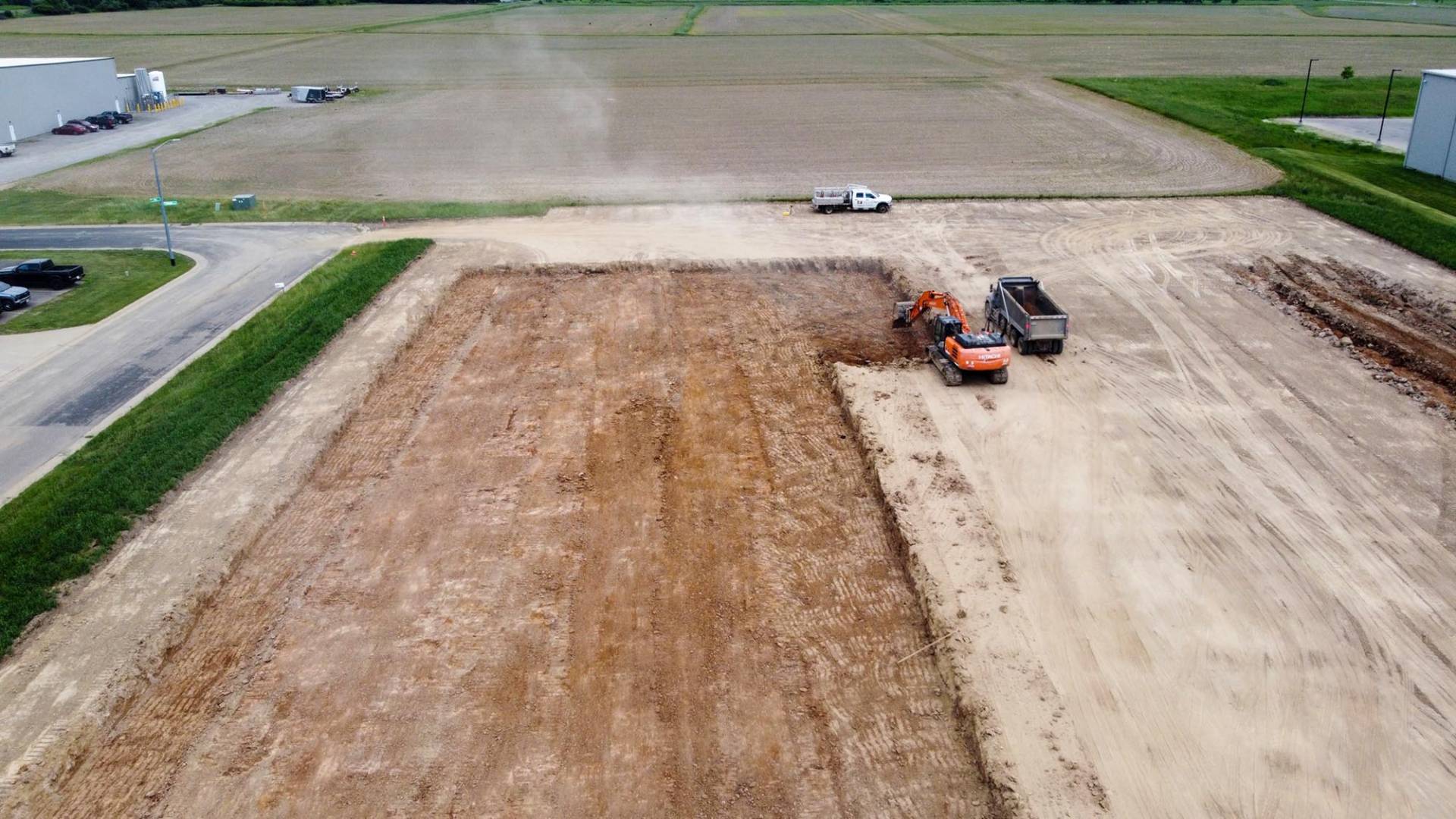 Plant 3 Construction DURING drone footage digging dirt
