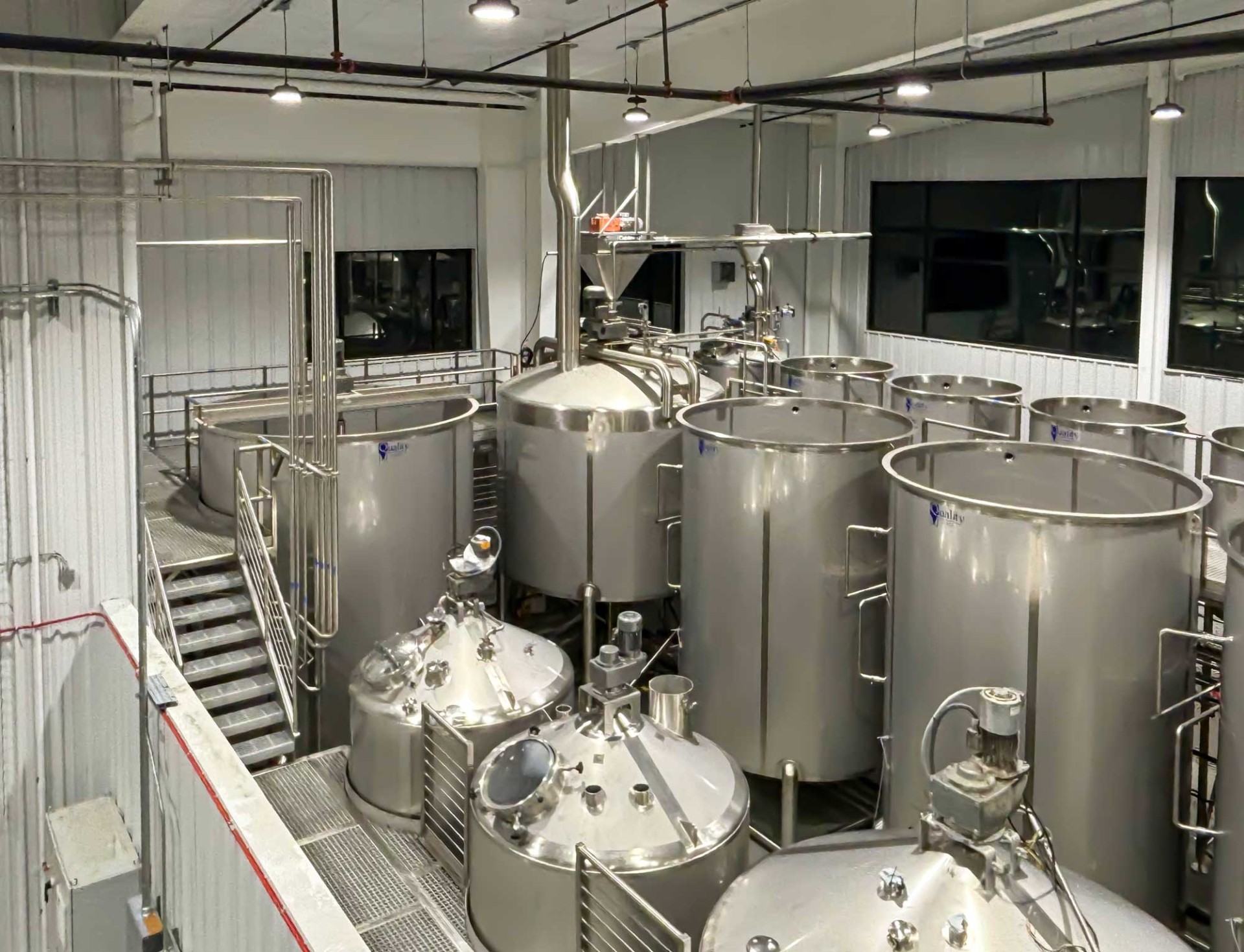 Large Brewhouse with open-top open-head brewing distilling stainless steel tanks