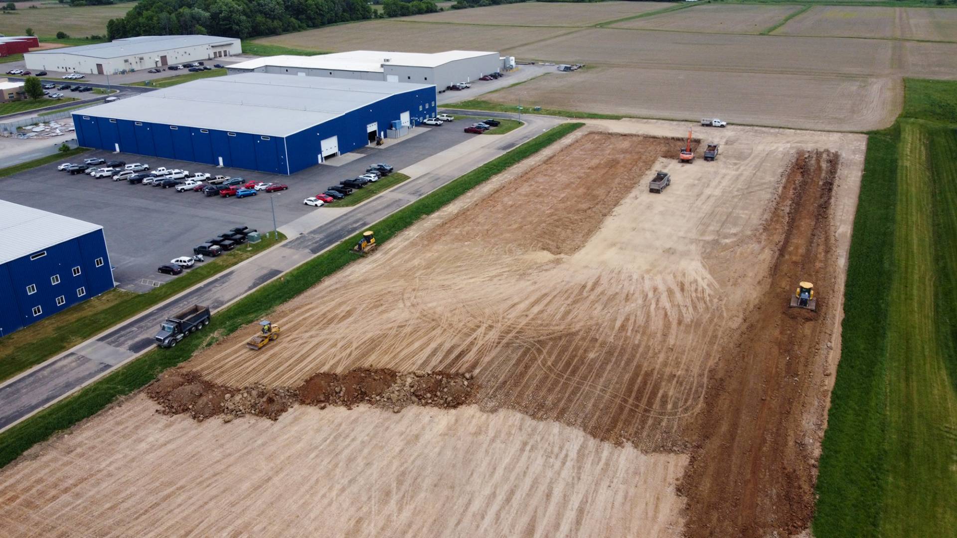 Plant 3 Construction DURING drone footage digging dirt