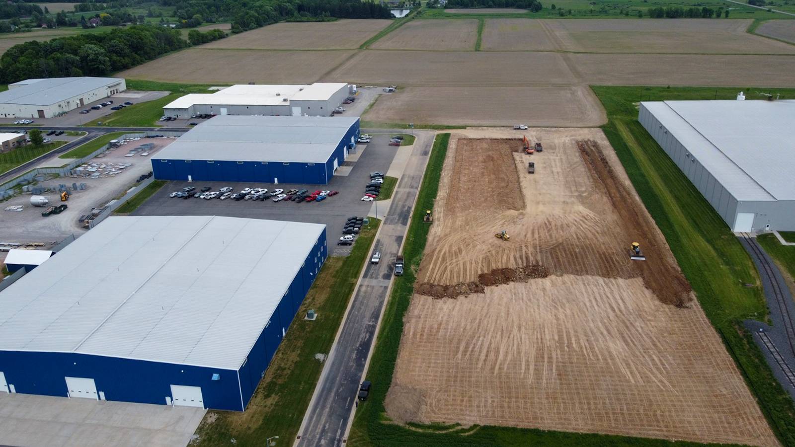 Plant 3 Construction DURING drone footage digging dirt